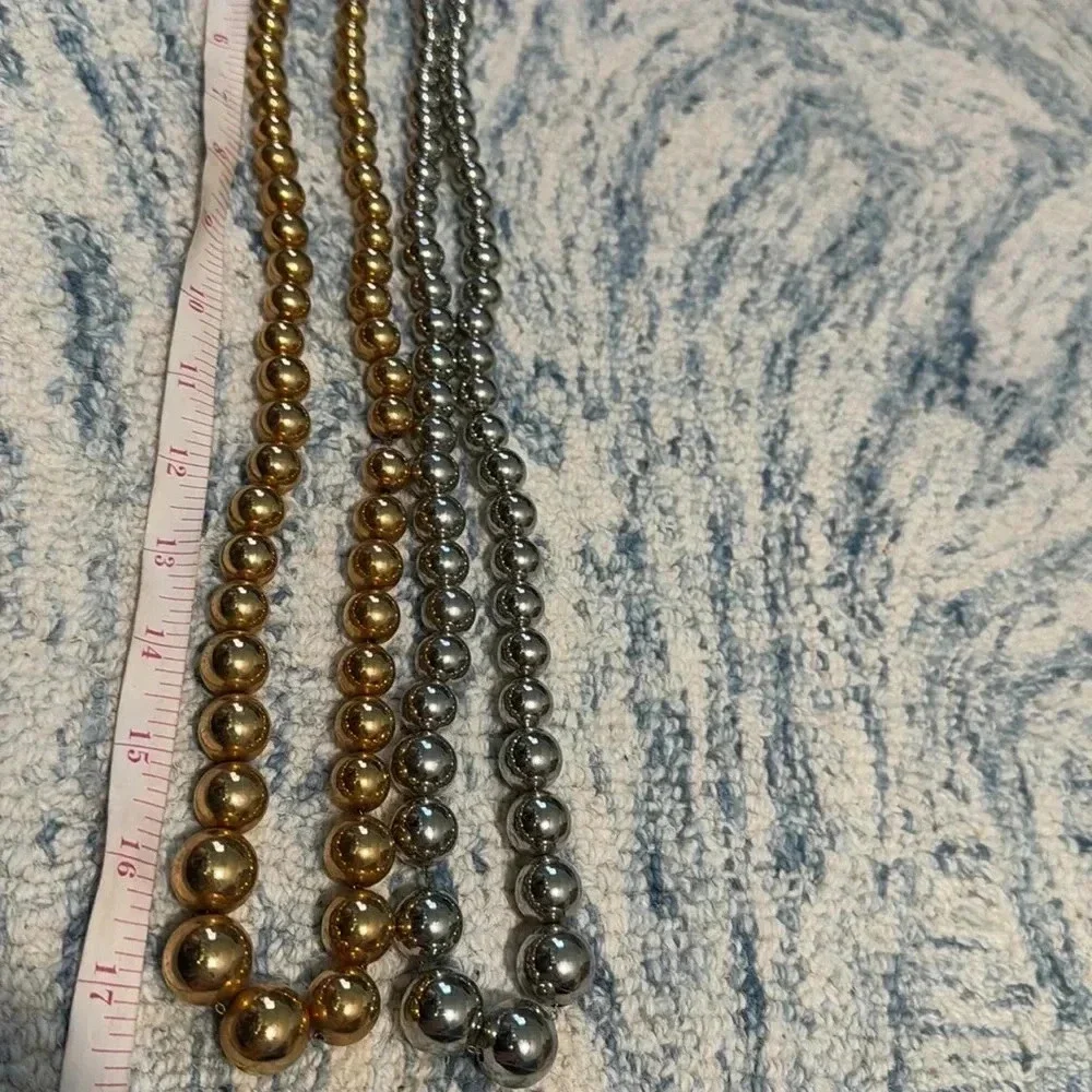 Gold and silver medium weight bauble long necklaces ￼